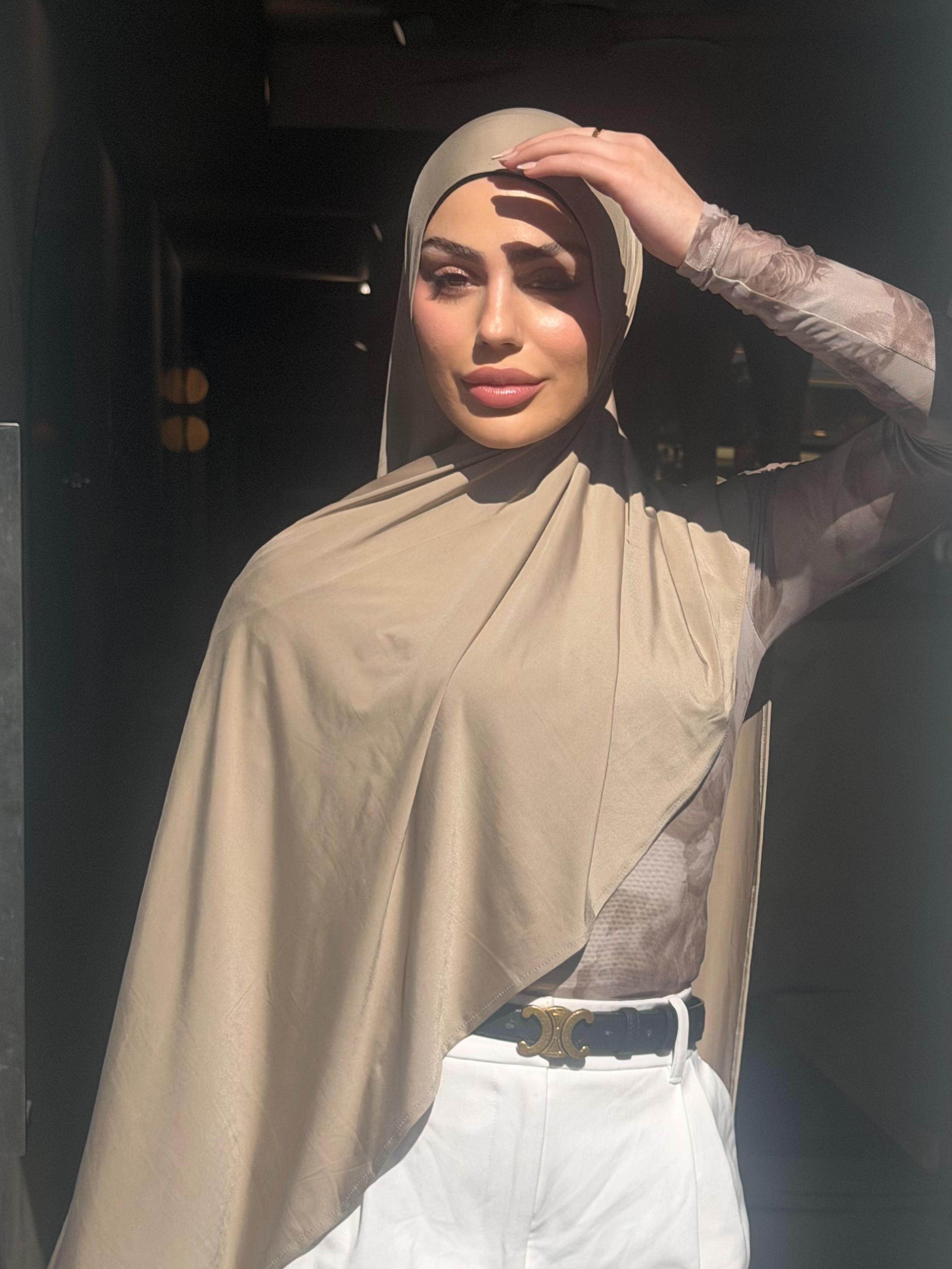 A woman wearing an instant liquid jersey wrap shawl in sydney, Australia. 
